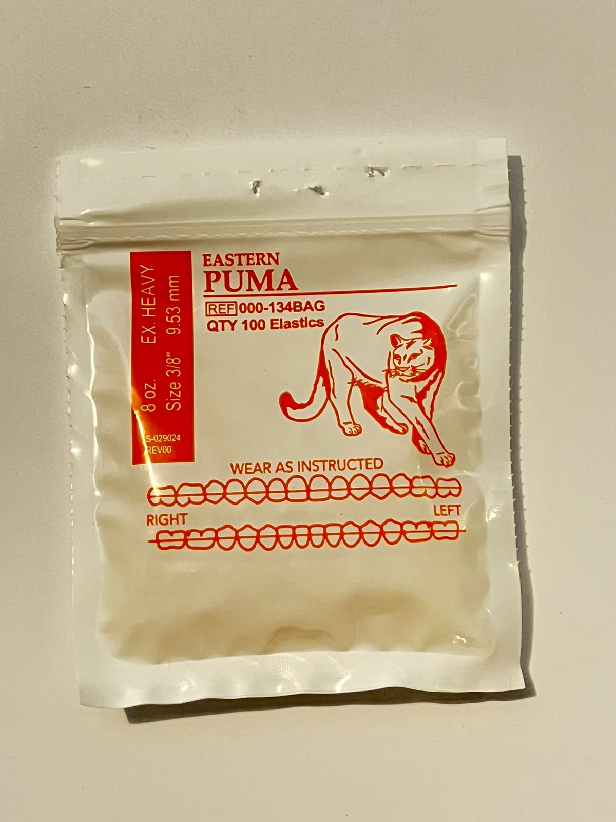 Elásticos extraorales american orthodontics por sobre Puma 8 onzas 3/8