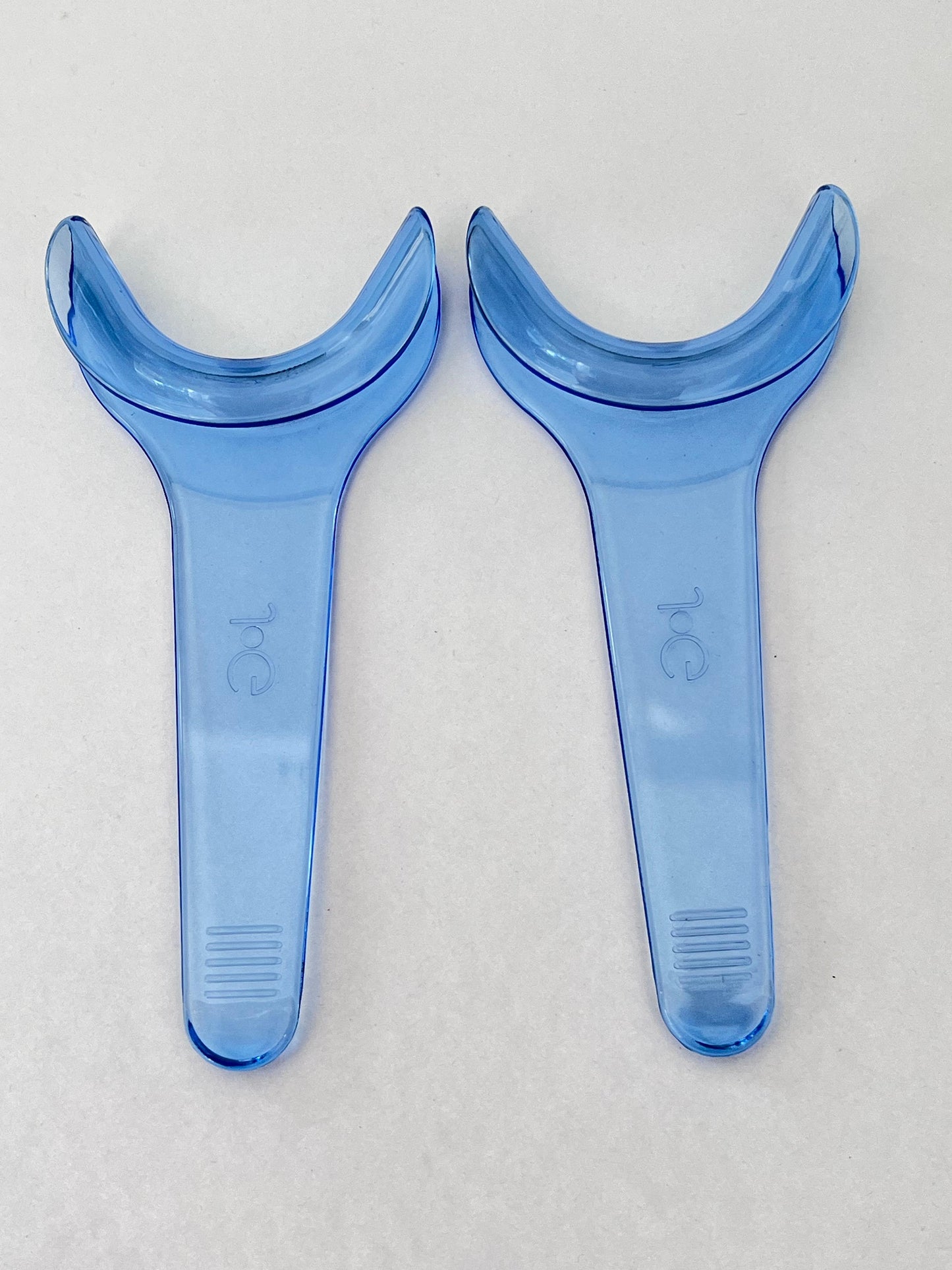 Retractor de carrillos ANELSAM para fotografía tamaño adulto
