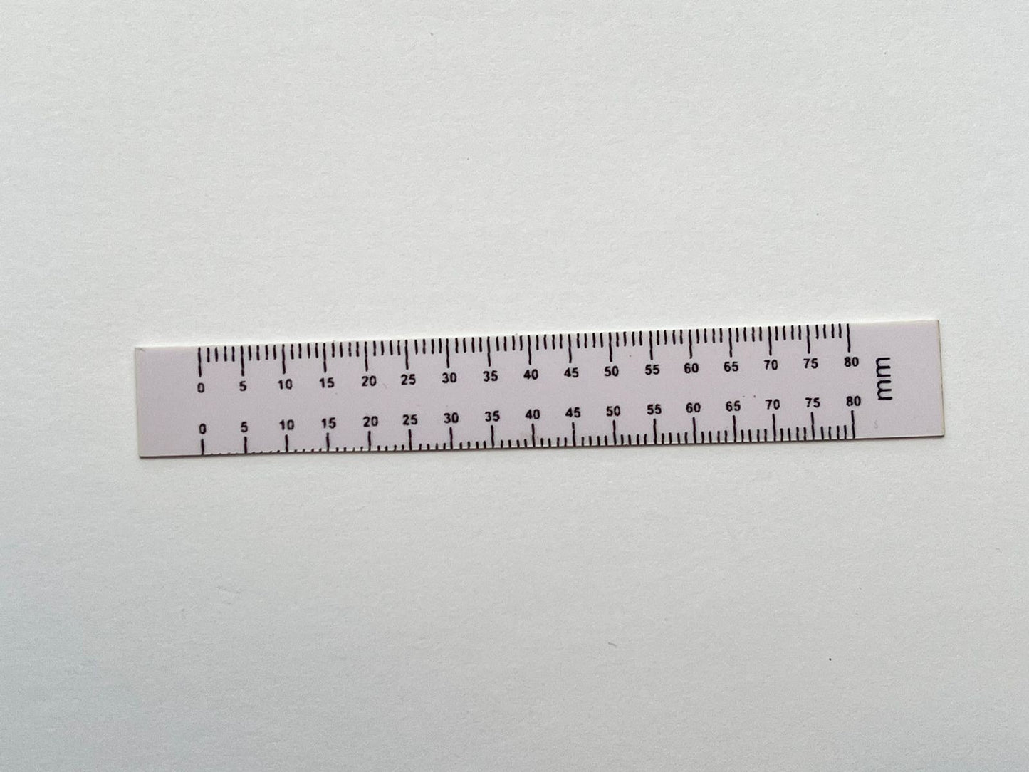 Regla milimétrica plástica steel