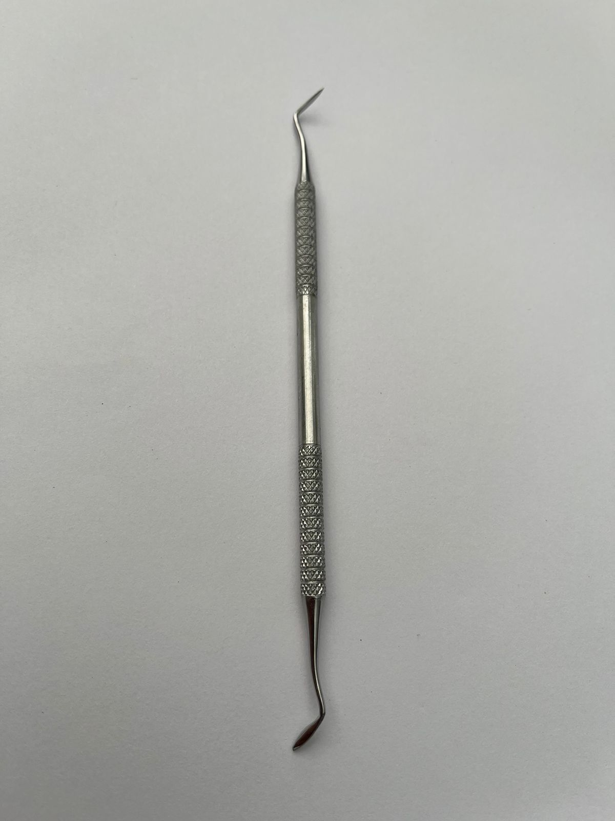 Condensador obturador Hollenback Arain