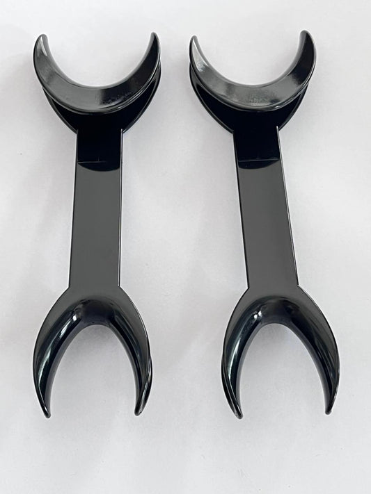 Retractor negro para fotografía par adulto
