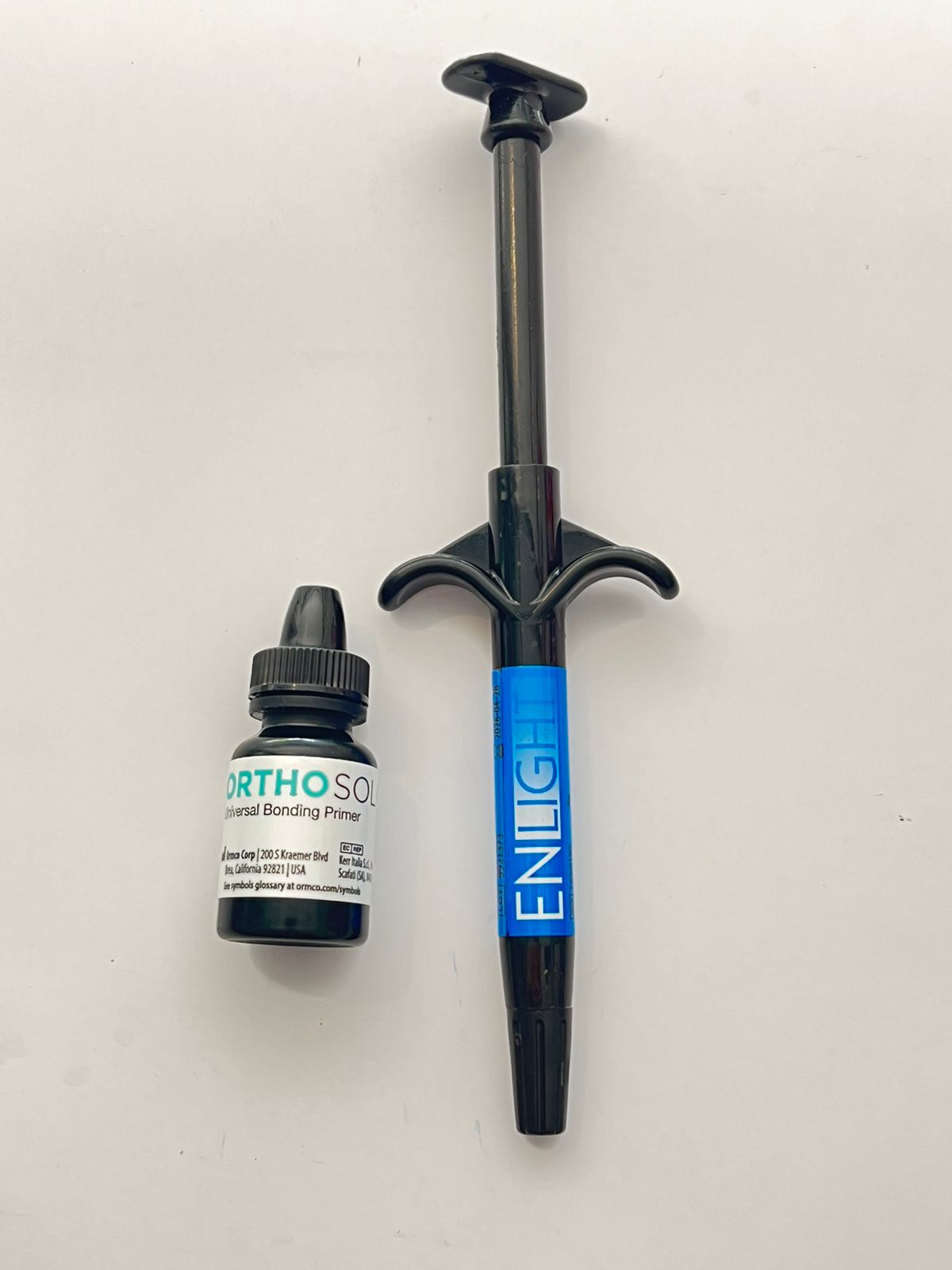 Resina ortodoncia Enlight con adhesivo ormco