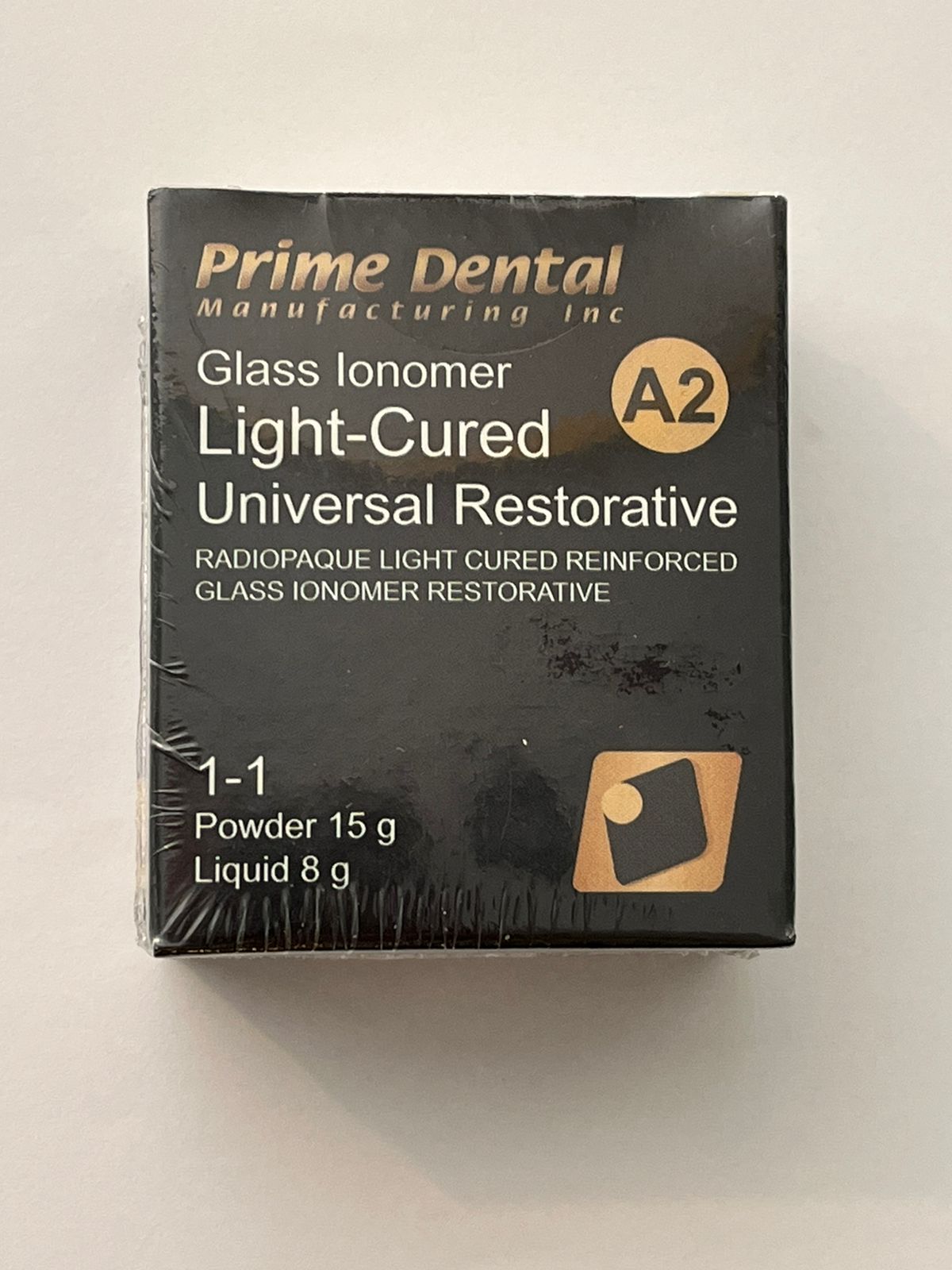 L/C Glass Ionomer Restorative. (Cemento de Ionomero de Vidrio Restaurativo Fotocurable) color A2